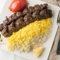 Koobideh/Shami Kabob (Ground beef) · Grilled ground beef with special seasoning, served with rice, bread and salad.