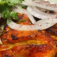 Tandoori Chicken Kabob · Chicken leg marinated with special spices, grilled, served with rice, salad and bread.