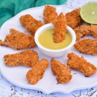 Crispy Chicken Tenders with Honey Mustard Sauce · Customer's choice of Delicious fried Crispy Chicken Tenders, served on a bed of golden crisp...