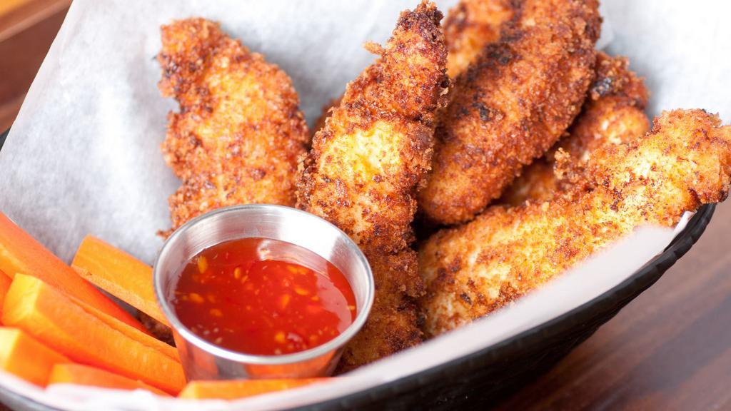Crispy Chicken Tenders with Sweet & Sour Sauce · Customer's choice of Delicious fried Crispy Chicken Tenders, served on a bed of golden crispy fries and served with a side of Sweet & Sour sauce.