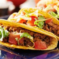 Super Asada (Beef) Taco · Incredible House Taco prepared with Ground beef, beans, cheese, lettuce, tomato, onions, cil...