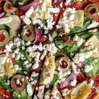 Greek Pizza · Tomato sauce, artichoke, olives, onions, spinach, feta, served with sun-dried tomato drizzle...