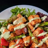 Paneer Tikka Salad · Spiced cottage cheese cubes (paneer) cooked with onions and peppers in a bed of salad greens...