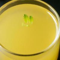 Ginger Mint Lemonade · Fresh ginger and turmeric roots cooked with mint, sweetened with allulose and monk fruit, mi...