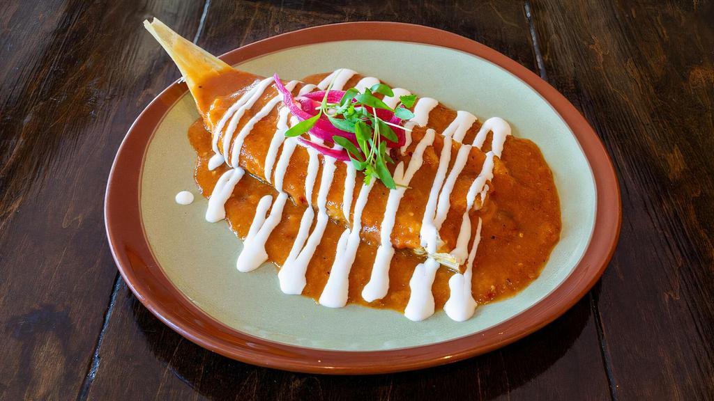 Tamales · Braised chicken | mole amarillo | roasted peppers | queso Oaxaca | pickled red onion | cilantro