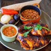 Wood Roasted Chicken · Roasted potatoes | peppers & onions | salsa rustica |  smoked bacon pinto beans