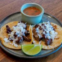 Kids Steak Tacos · Marinated flank steak, Oaxaca cheese, salsa rustica