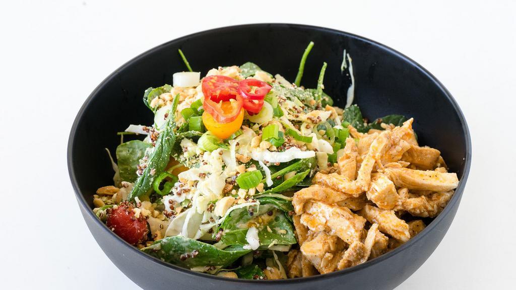 Greens & Grains with Chicken Salad · Gluten-Free.  Hot & spicy. Green cabbage, baby spinach, baby kale, red chili peppers, quinoa, chickpeas, feta cheese, red wine vinegar, lemon tahini dressing cherry tomato, scallions, peanuts, chicken.