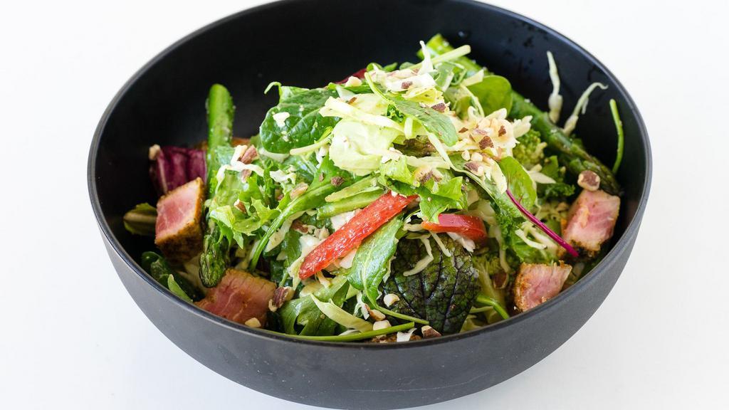 Paleo Diet Salad · Gluten-Free.  Spring mix,  baby kale. Green cabbage, broccoli, asparagus, bell pepper, scallions, cherry tomatoes, roasted almonds, French tarragon shallot vinaigrette, seared ahi tuna.
