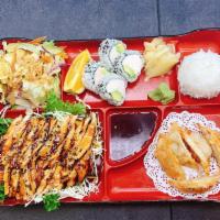 A1-Chicken/Gyoza/CA · A1. Chicken breast teriyaki, gyoza, CA roll. served with miso soup, salad and rice