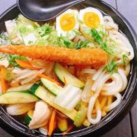 Nabeyaki Udon · chicken  + vegetales + boiled egg + udon noodle in broth + shrimp tempura on the side