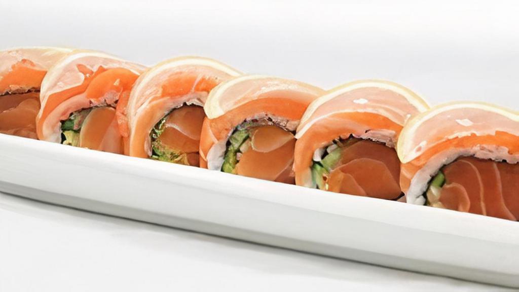 49er's Roll · salmon + avocado + cucumber covered w/ salmon + sliced lemon