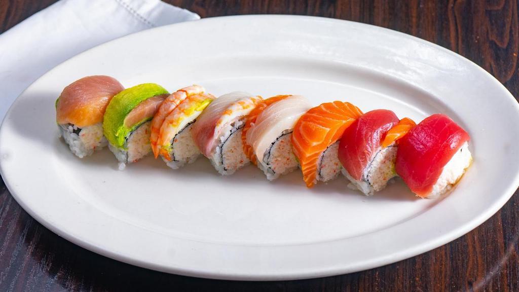 Rainbow Roll · crab + avocado covered w/ tuna + salmon + albacore + ebi + avocado