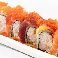 Play Boy Roll · crab + deep fried shrimp covered w/ salmon + tuna + mango + tobiko + unagi and mango sauce