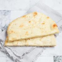 Garlic Naan · Indian style flatbread with roasted garlic, a favorite side to every Indian curry, dal, and ...