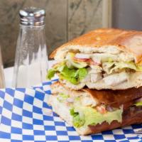 Grilled Chicken Sandwich · Chicken, onions, lettuce, tomatoes, cheese, mayo.