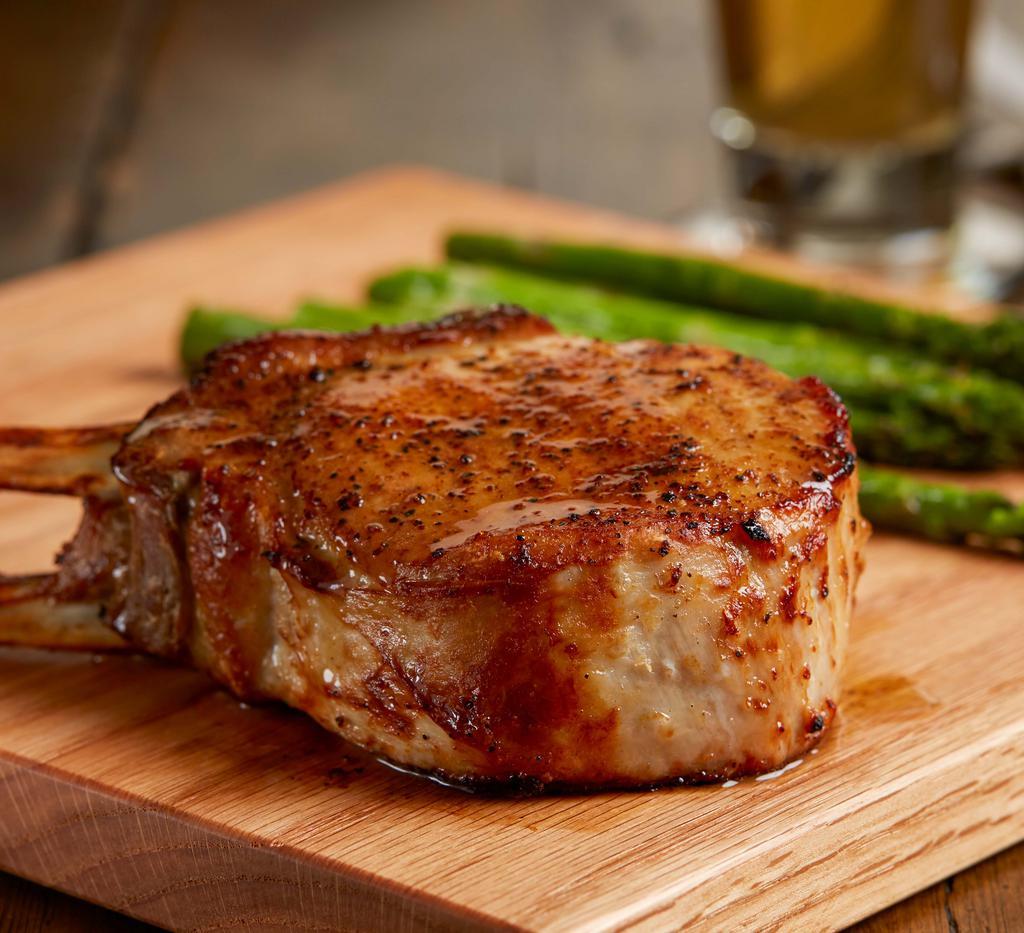 Double Bone-In Pork Chop (Every Day After 4 Pm) · Slow-roasted, double bone-in pork chop | choice of two signature sides