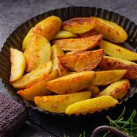 Garlic Tikka Fries · Exquisite potato french fries tossed in with miced garlic, parmesan cheese, onions and tikka...