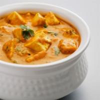 Butter Paneer Masala · Exotic Indian paneer cheese immersed into a butter onion and tomato masala, served with a si...