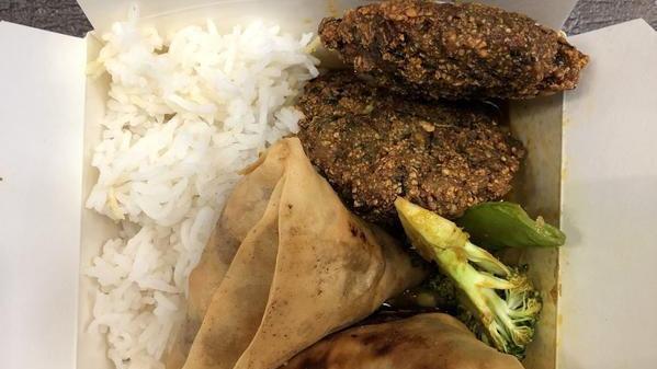 Falafel Samosa · House made, a savory fried crispy pastry filled with spiced potatoes, onions, peas, and lentils. Served with rice and stir fried vegetables.