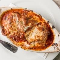 Lasagna · Layered with ricotta, beef, pork and veal, bolognese baked with monterey jack cheese.