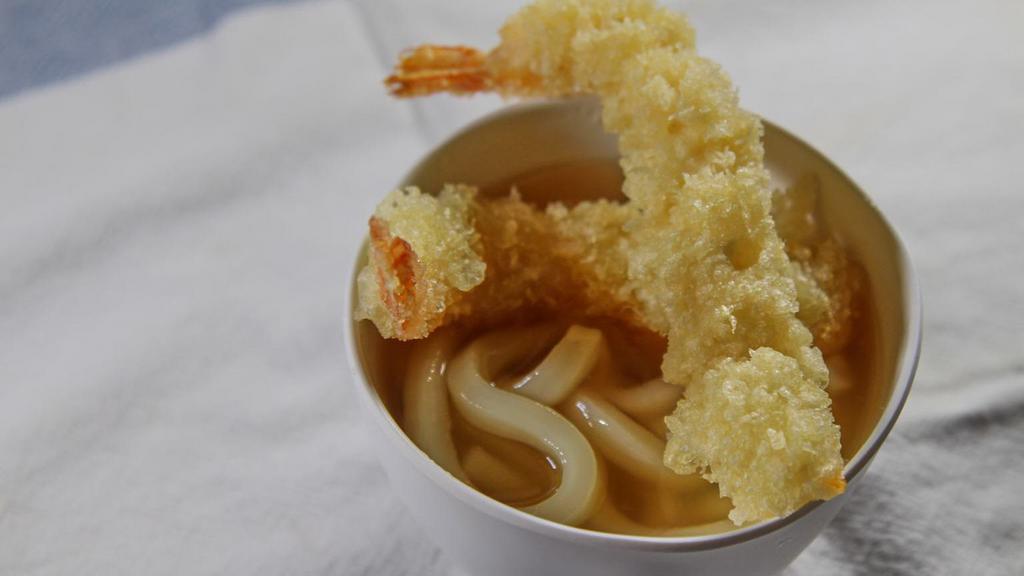Tempura Udon · Thick noodles with Shrimp and vegetable tempura in dash soup.