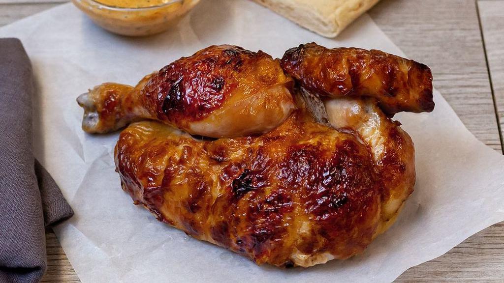 Half Rotisserie Chicken · Served with Artisan Ciabatta Bread and choice of sauce.