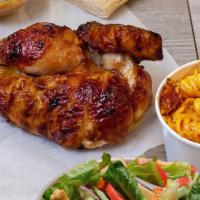 Half Rotisserie Chicken Meal · Served with your choice of sauce, 1 side, a Caesar salad and artisan bread