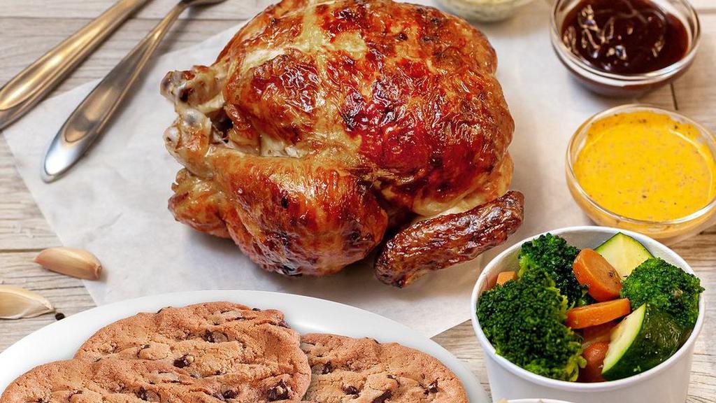 Whole Rotisserie Chicken Meal · Served with your choice of 3 sauces, 2 sides and 4 chocolate chunk cookies