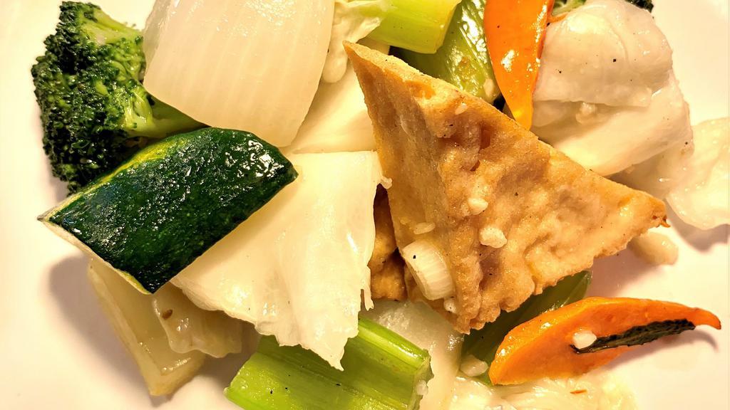 Tofu Vegetable Deluxe · Tofu, zucchini, cabbages, broccolis, celery, carrots and onions, stir-fried in garlic sauce.
