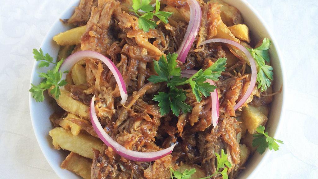 Pulled Pork Stoner Frjtz · Pulled pork stoner frjtz. Loaded frjtz with low and slow-cooked pulled pork, tossed in a bbq sauce, and served with pickled red onions.