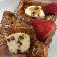 Le Pompidou French Toast · French toast with date butter and pancake syrup.