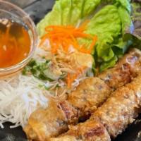 33. Fried Egg Roll with Vermicelli · Cooked in oil. crispy dough filled with minced vegetables. thin pasta.