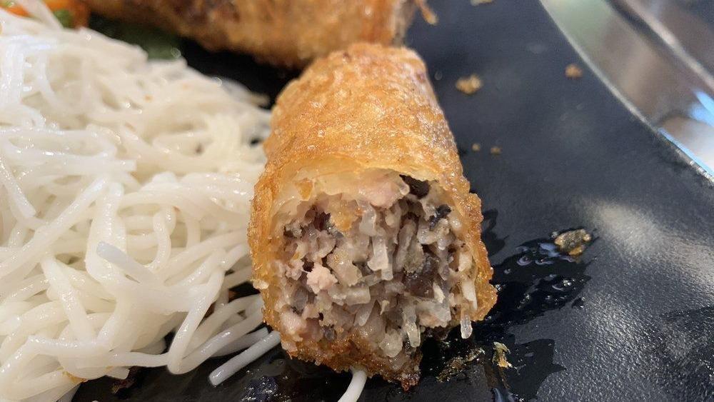 73. Fried Veggie Egg Roll with Vermicelli · Cooked in oil. crispy dough filled with minced vegetables. thin pasta.