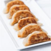 Sweet Potato Potstickers · Gluten-free potstickers filled with sweet potato, fresh garlic, and fresh ginger. Pan fried ...