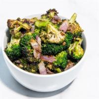 Roasted Broccoli with Ginger Garlic Sauce · Roasted broccoli, red onions, and our house-made ginger garlic sauce. (Gluten-Free & Vegan)