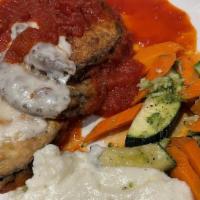 Eggplant Parmigiana. · Tomato / fresh mozzarella / basil.