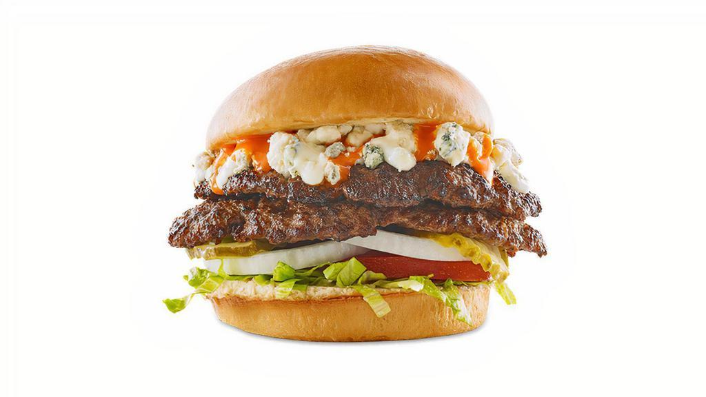 Buffalo Bleu Burger · DOUBLE PATTY / HAND-SMASHED / BLEU CHEESE CRUMBLES / MEDIUM BUFFALO SAUCE / SHREDDED ICEBERG / TOMATO / ONION / PICKLES / BLEU CHEESE DRESSING / CHALLAH BUN