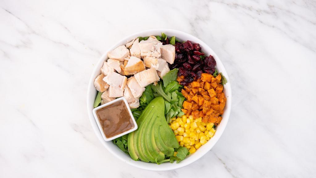 Thrive Grateful Salad · Arugula, corn, roasted sweet potatoes, dried cranberries, avocado, balsamic vinaigrette. Served with your choice of chicken, or roasted sesame tofu.