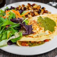 Pesto Crêpe · Chicken breast with mushrooms, tomatoes, roasted almonds, provolone cheese, feta cheese and ...