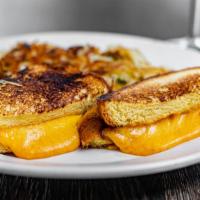 Grilled Cheese · Served with home potatoes or fries.