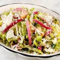 Insalata Mista · Romaine, radicchio, garbanzo, pickled onions, shaved parmesan green beans and peperoncino.