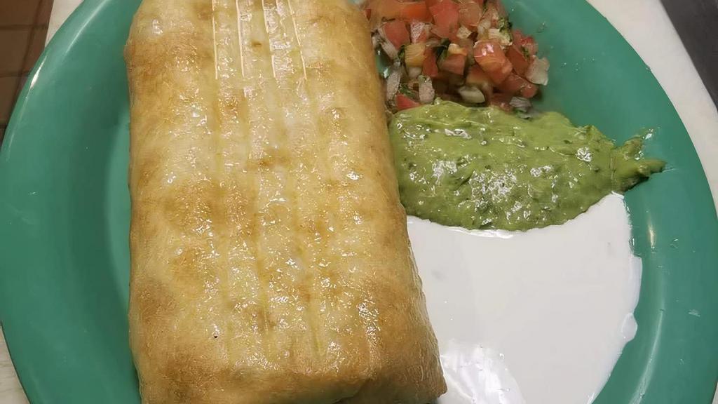 Chimichanga · Deep-fried burrito with your choice of meat sour cream, guacamole, and pico de gallo.