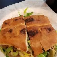 Torta · Choice of meat, lettuce, tomato, sour cream. guacamole, melted cheese on a flatted bread