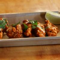 Chili Lime · Chili and citrus, topped with cilantro, served with a lime wedge. Twice Fried.