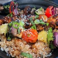 Grilled Skewer Rice Bowl · A rosemary rice bowl with grilled chicken and choice of vegetable skewer, topped with choice...
