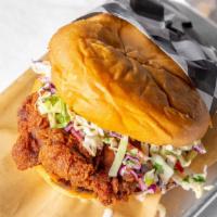 Fried Chicken Sandwich · Hand breaded chicken breast with slaw, pickles, and comeback sauce on a challah bun.
( tosse...