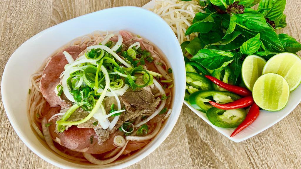 Rare Filet Mignon Steak Pho · Rare FILET MIGNON Steak and Rice Noodles in a Fragrant Beef Both served with Bean Sprouts, Basil 🌿 , Limes , Hoisin and Chili 🌶  Sauce & Peppers ..