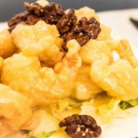 18. Honey Walnut Prawns · Prawns crisp-sauteed in a tangy white cream sauce and topped with honeyed walnuts.