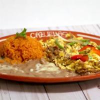 44. Machaca Beef · Served with rice, beans and tortillas corn or  flour.